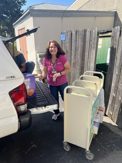 Melanie Loading Up Diaper Drive Donations